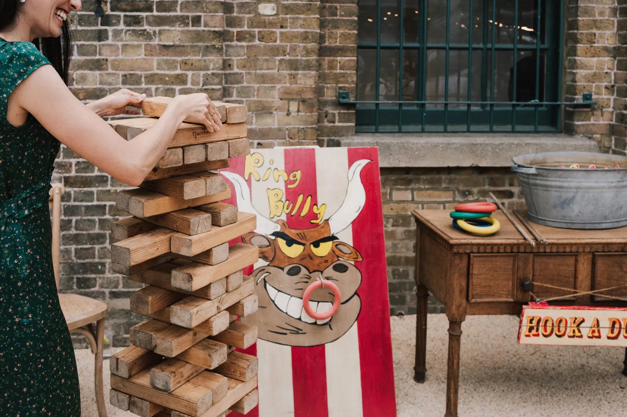 Giant Jenga and fairground games in the courtyard